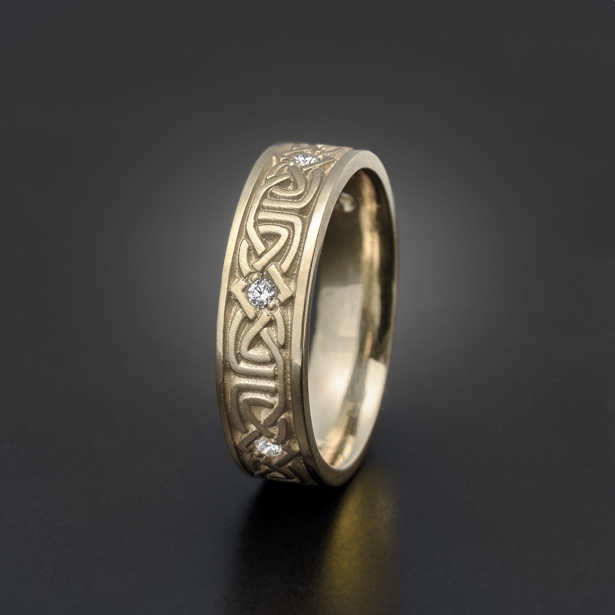 Narrow Labyrinth Celtic wedding band with diamond accents in 18K white gold